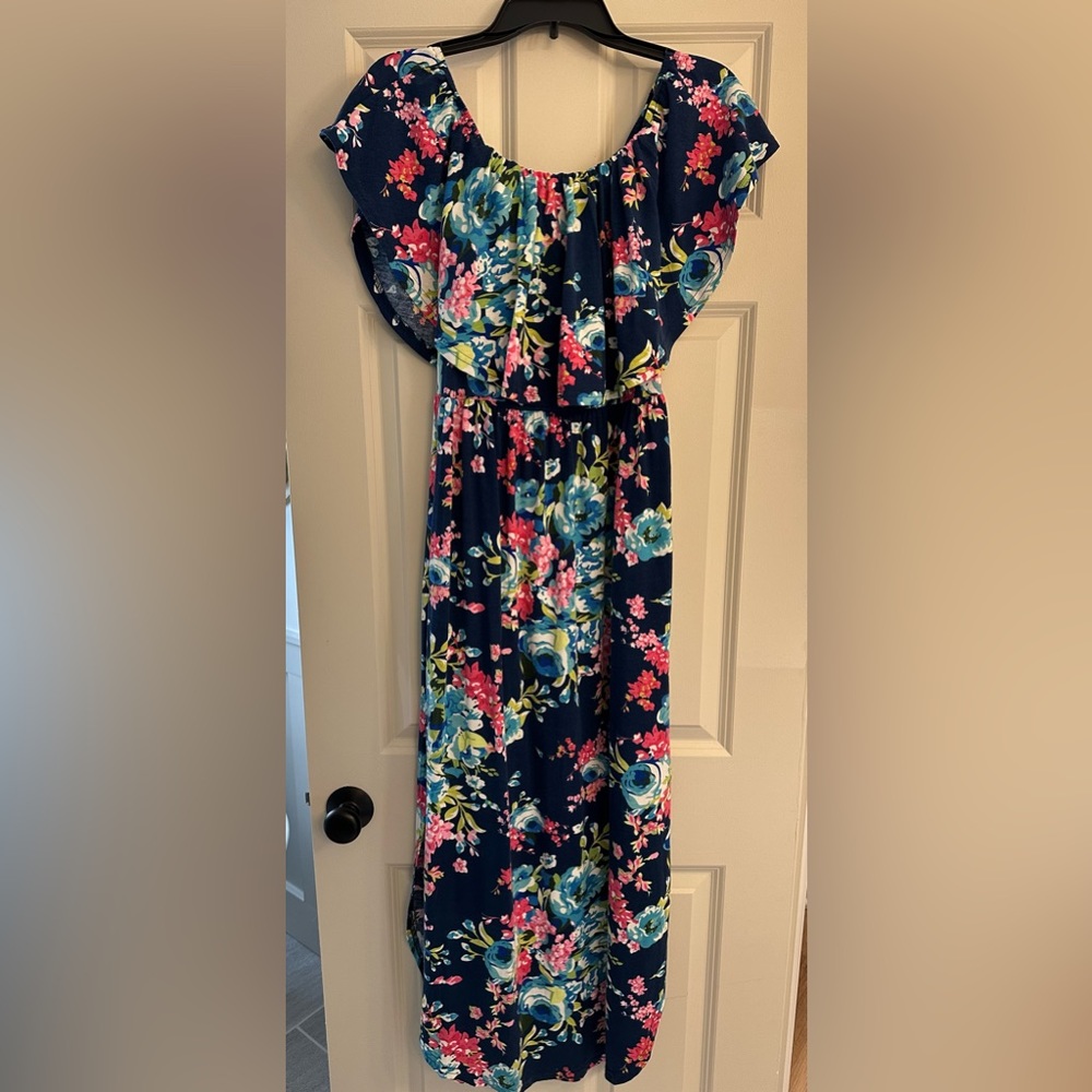 Multi colored off the shoulder floral maxi dress.